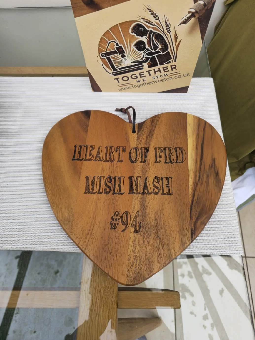 Engraved wooden heart-shaped recognition piece reading Heart of FRD Mish Mash