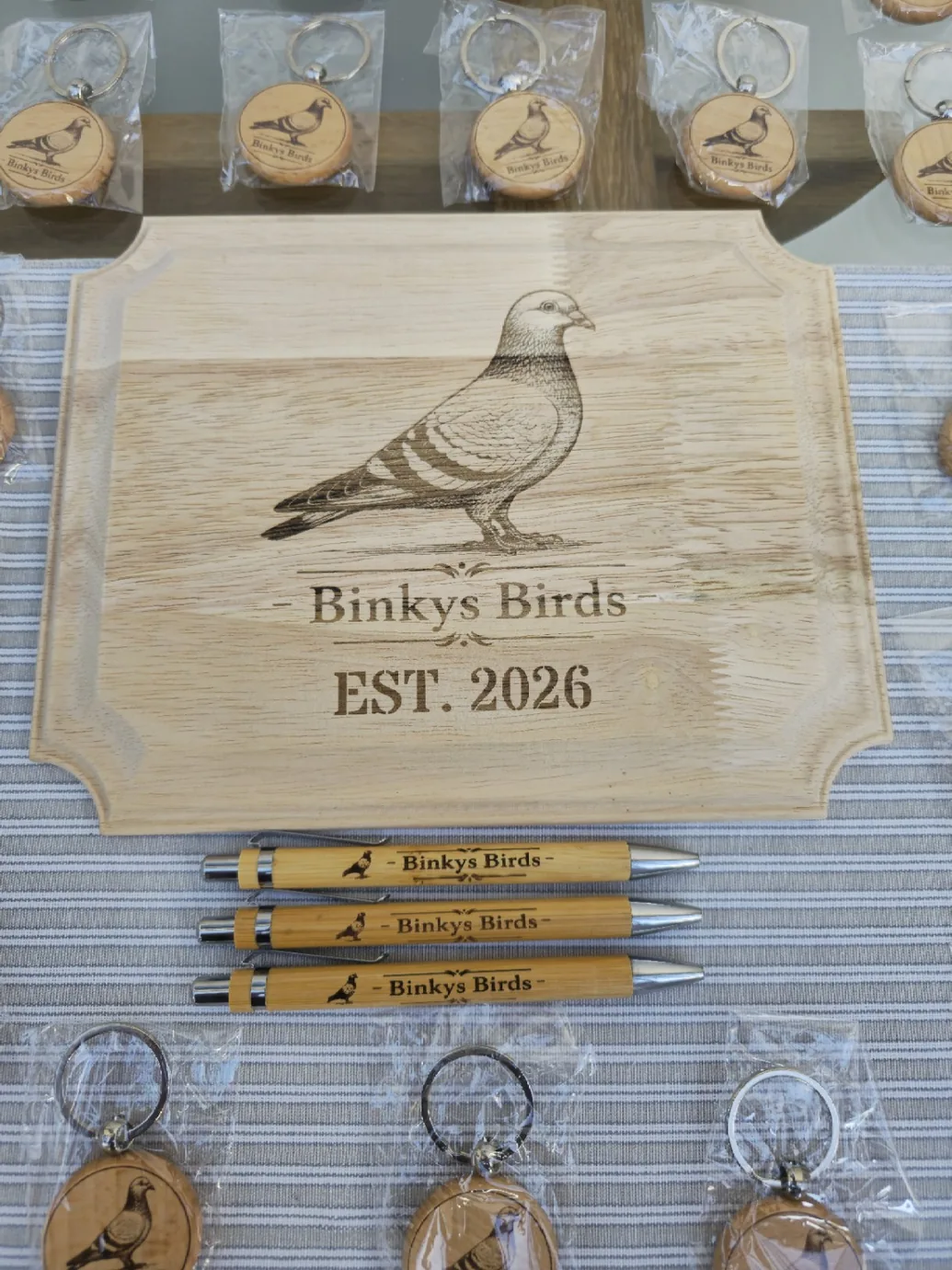 Engraved wooden Binkys Birds plaque with matching pens and round keyrings