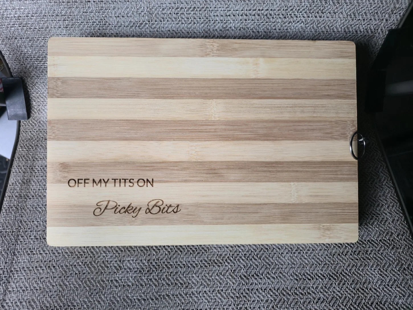 Engraved striped wooden chopping board