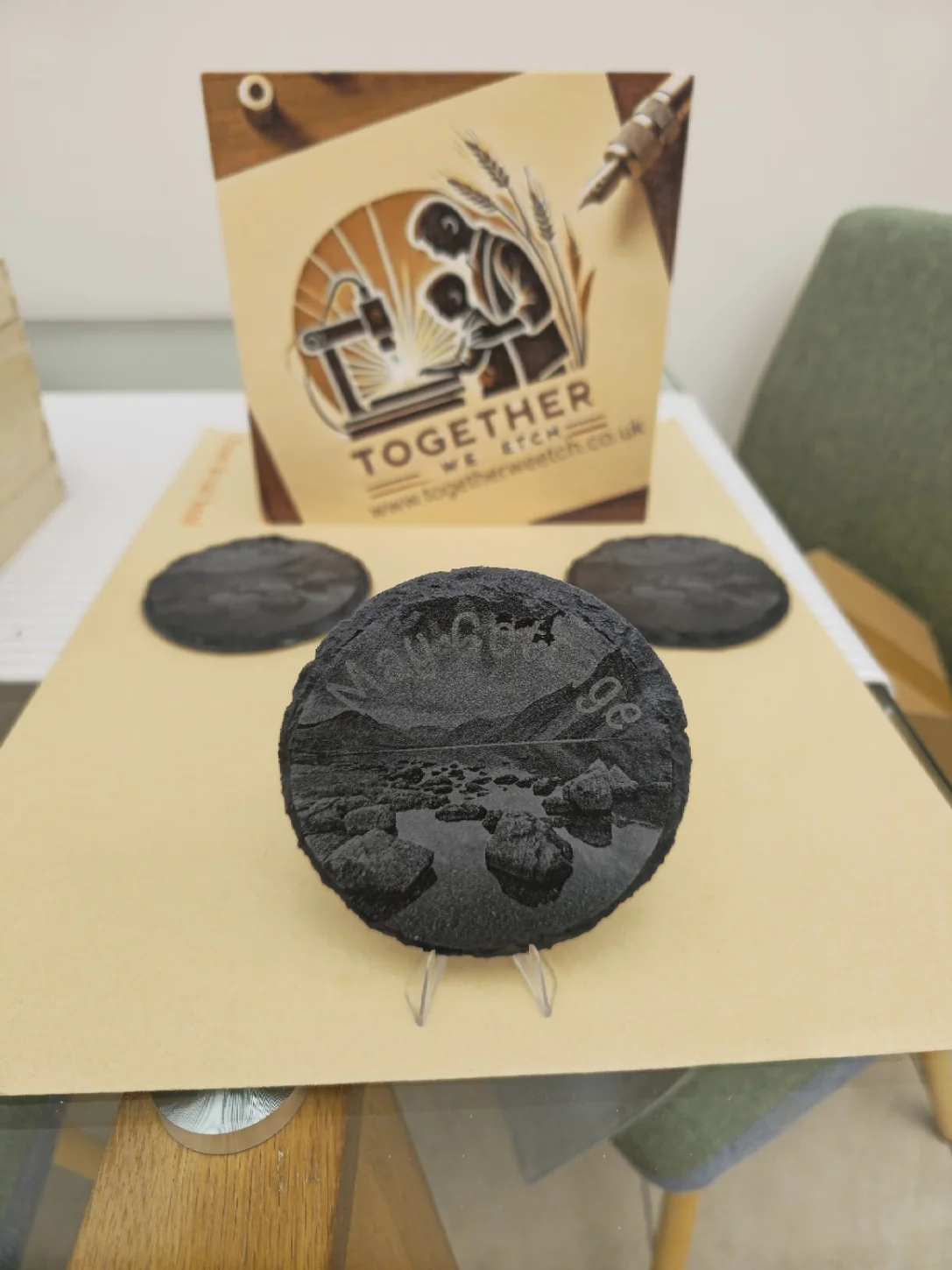 Selection of laser engraved round slate coasters