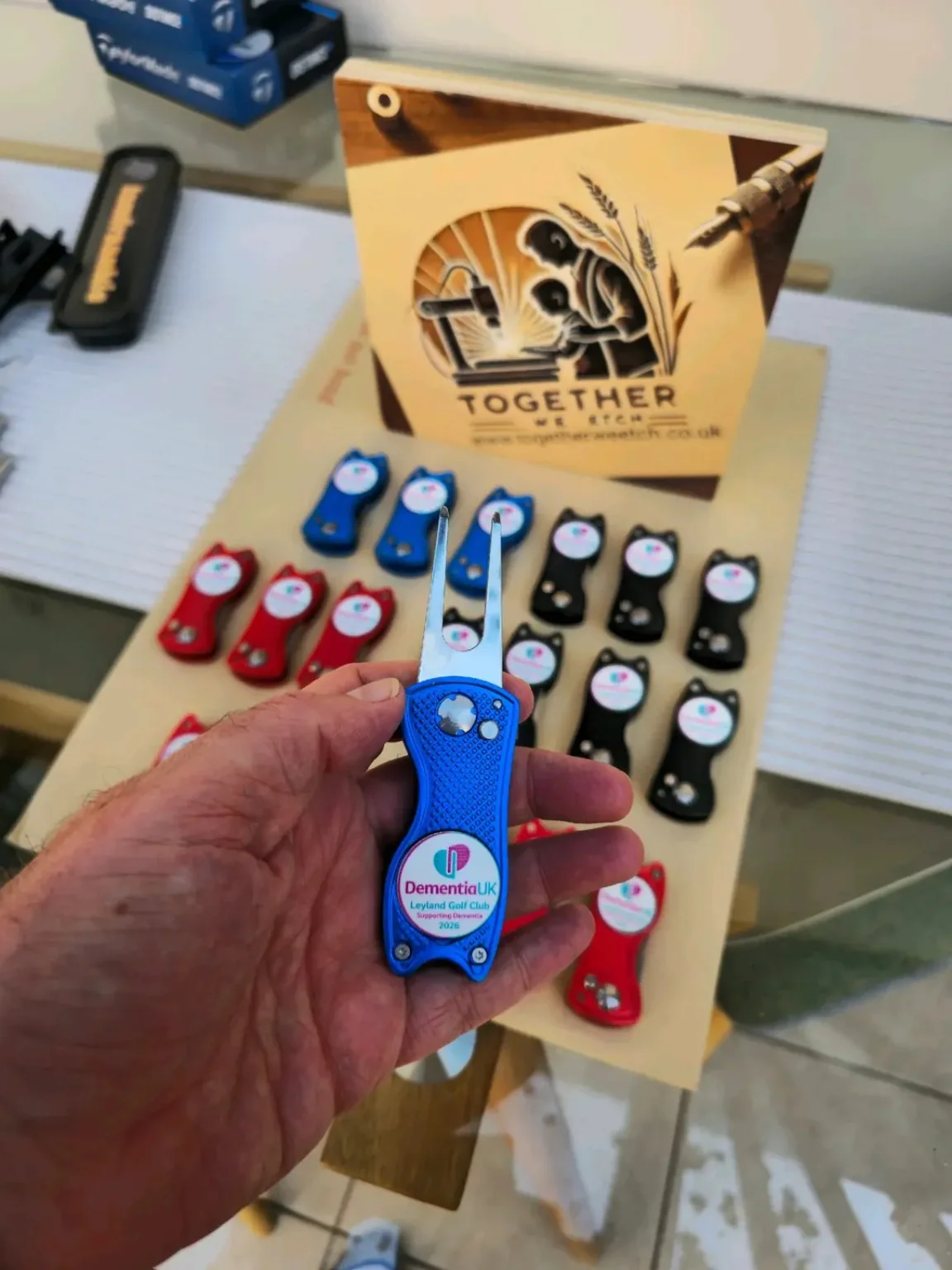 Real personalised blue divot repair tool produced by Together We Etch