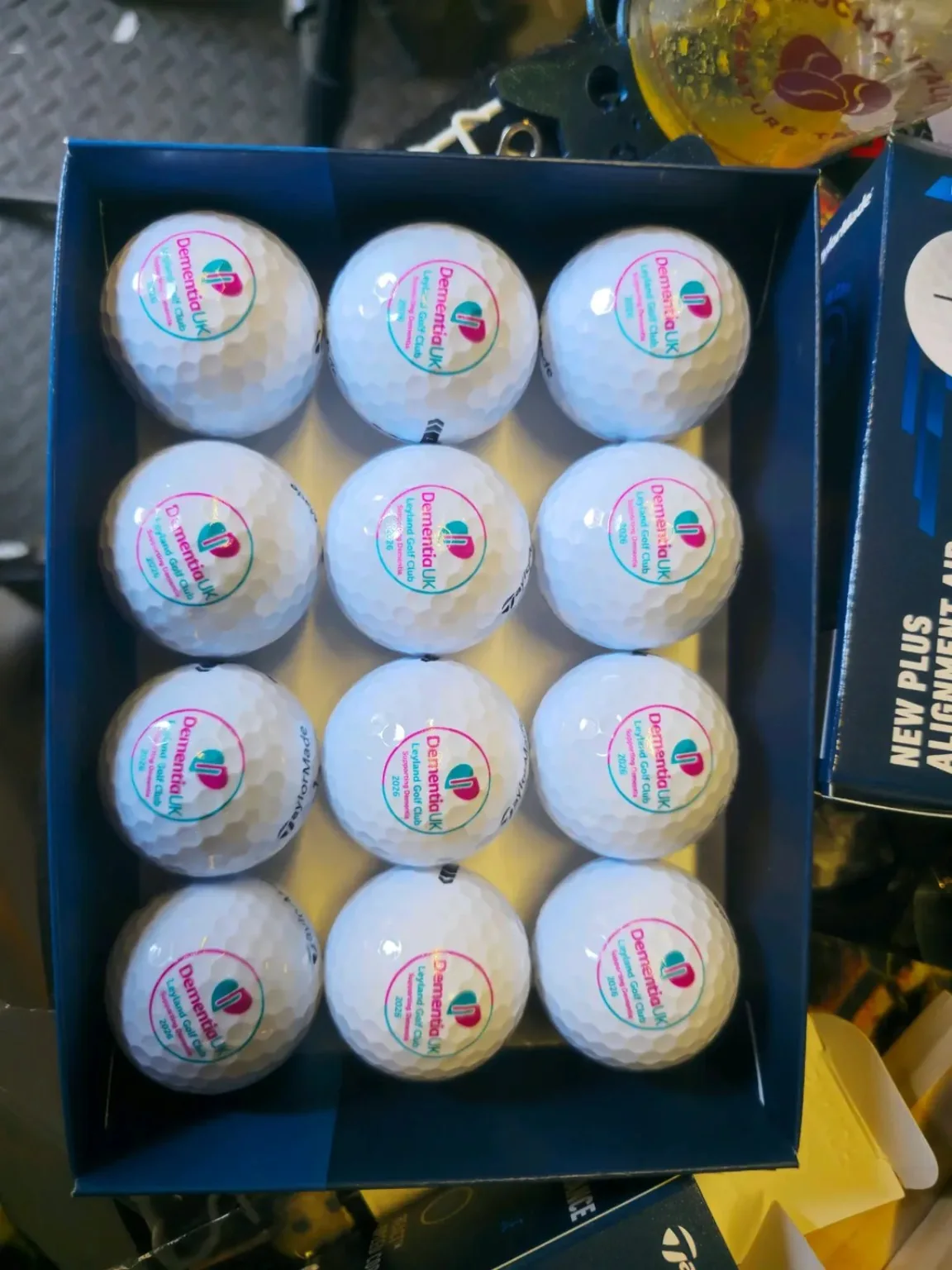 Personalised golf balls produced by Together We Etch